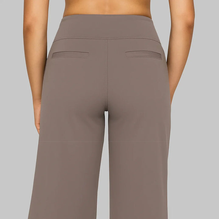 Women | Wide, high-waisted trousers with side and back pocket