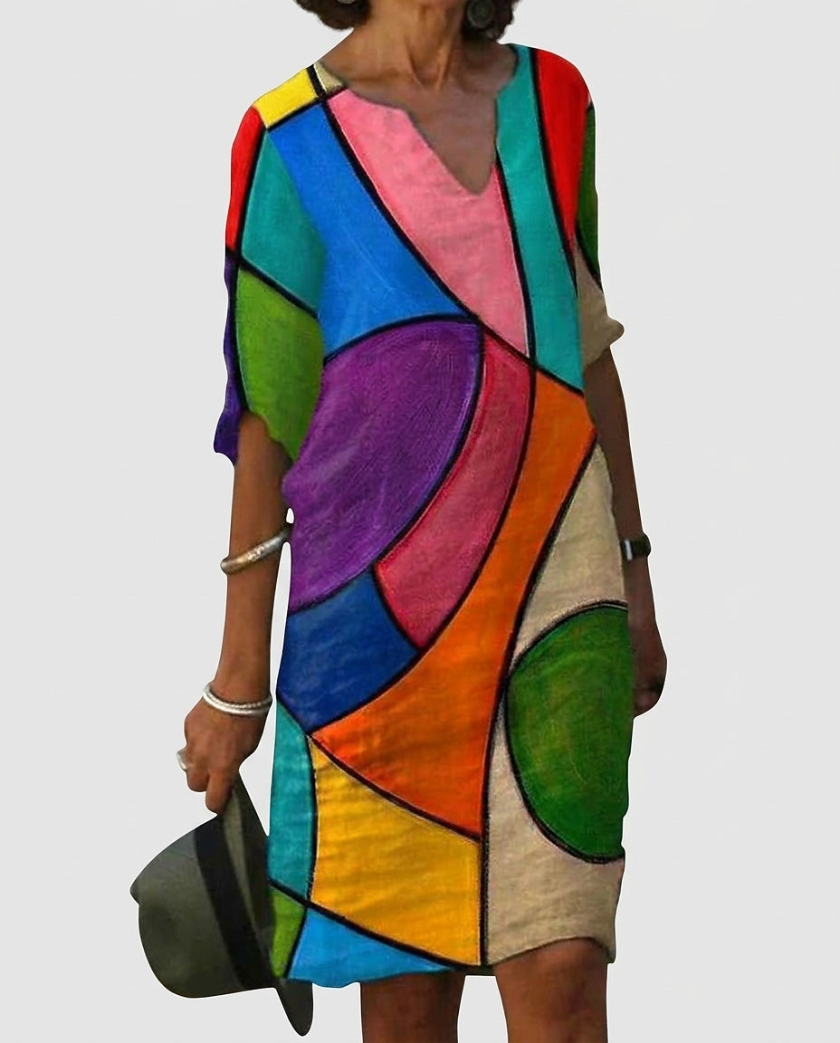 Women's Graphic Print V-Neck Mini Dress - Front [Lystr 6a992a4b8fb1eea96e728d0e:front]