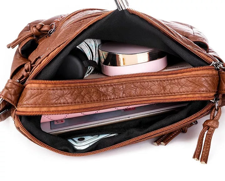 Women | Bag with long strap and subtle details